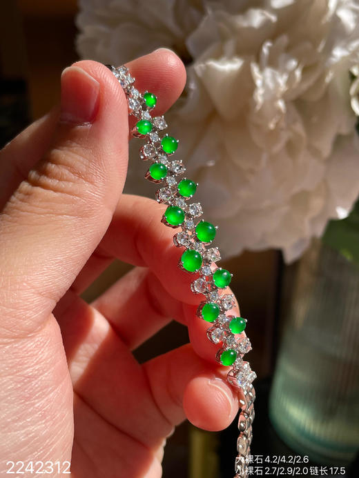 2242312，玻璃黄阳蛋面手链。具体价格微信咨询 商品图0