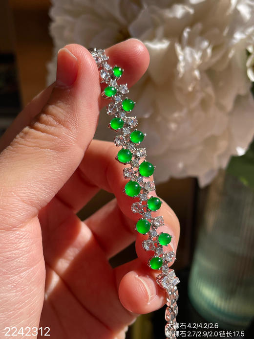 2242312，玻璃黄阳蛋面手链。具体价格微信咨询 商品图1