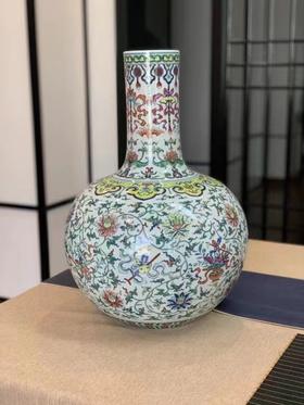 青花斗彩莲托八宝天球瓶