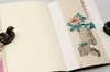 主题笔记本：《菩提叶 十八罗汉》《宿妆隐笑》，100g米色道林纸，21cm*13cm，合售40元。

装帧：锁线薄胶并用帆布包边，可大尺度近180度平摊，随心书写，随意勾画，每册内页160页，18幅图 商品缩略图4