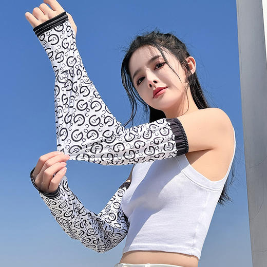 【冰凉一夏！夏季宽松版防晒冰袖】gao效隔热，防晒防紫外线，柔软肤感，持续凉感，冰丝防晒袖套女户外骑行开车防紫外线印花冰袖夏日 商品图3