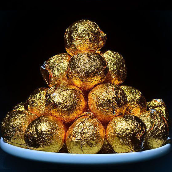 【限时回馈】2014年陈原料！超强熟茶龙珠来袭！ 永德忙肺纯料古树金弹子 ！有味道有茶气而汤感极其温润的好龙珠！ 随身携带龙珠利器！