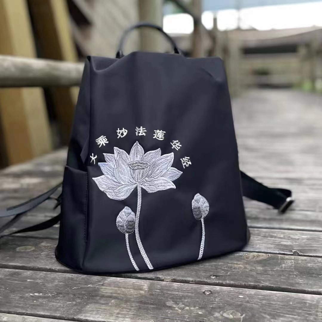 女士莲花双肩背包