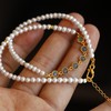 D477088 天然淡水珍珠手链  非常适合这个季节佩戴哦 双圈手链 或者颈链佩戴都很美 尺寸约4mm 搭配纯银鎏金镶嵌海蓝宝链条 纯银鎏金扣镶嵌天然碧玺雕刻吊坠  特价💰589/一条 商品缩略图3