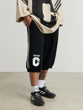 CryingCenter 运动条纹收口宽松七分萝卜短裤