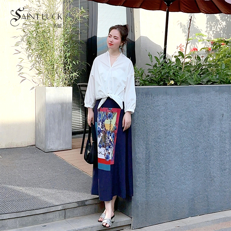 SAINT L’UCK/圣媛女装 度假风印花针梭配中长款半身裙SA220B33