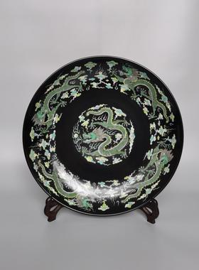 黑地素三彩九龙大盘