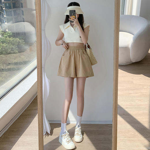 夏季新款休闲短裤女，水洗棉工装裤，宽松高腰阔腿裤女，韩系百搭三分裤。舒适棉质面料，透气性好，穿着舒适。宽松的设计，自由活动，不受束缚。高腰设计，修身显瘦，展现完美身材。阔腿裤型，轻松自如时尚百搭！ 商品图4