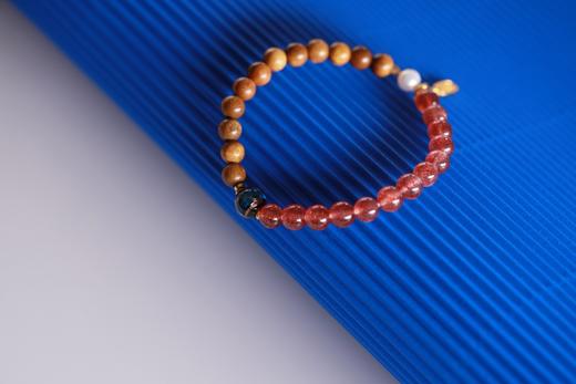 JSNM0142-3°金丝楠木草莓晶手串 商品图1