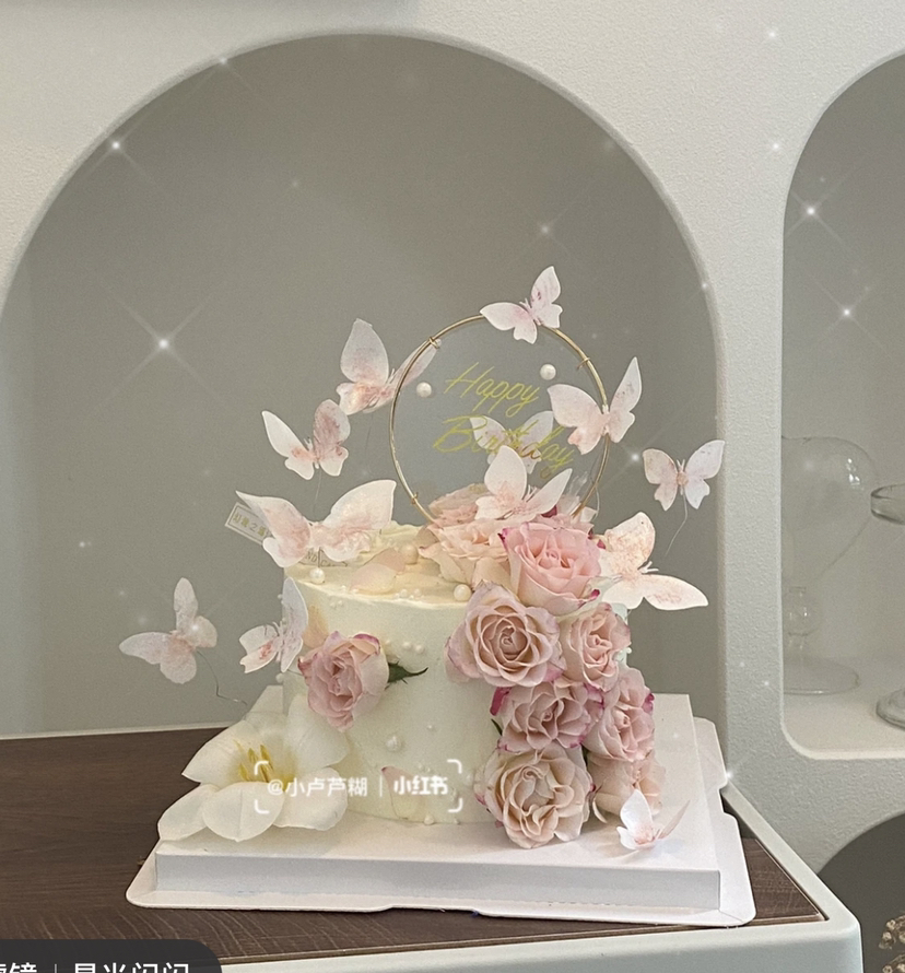 鲜花蝴蝶仙女粉色生日蛋糕