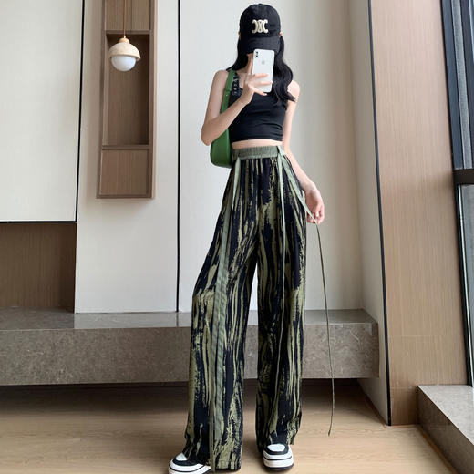 夏季必备，阔腿裤女王！雪纺面料轻盈透气，高腰设计拉长腿型。独特垂感扎染，展现个性魅力。冰丝防晒面料，随心穿搭，尽享舒适自在。 商品图2