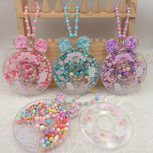 【小卷毛】甜甜圈炫彩DIY礼盒，打造属于自己的小首饰✅培养动手创造力，提高审美时尚感 ✅环保塑料材质✅可爱糖果色系，热烈而缤纷✅附赠小兔子收纳盒，可以制作出3条项链➕3条手链。 商品图1