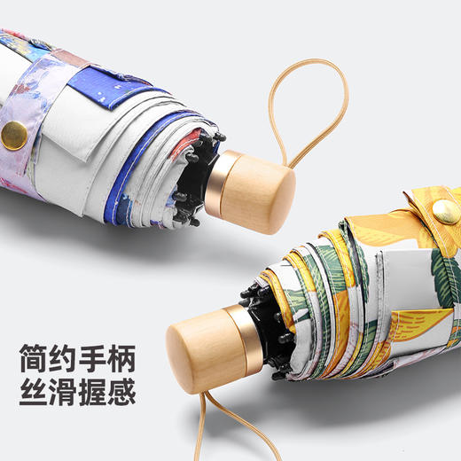 新款高档双层印花木柄五折雨伞，晴雨两用，可防晒遮阳，女士双人轻松搭配。手握舒适，轻便易收，不占空间。让你在任何天气下都能够美丽自信地出门！ 商品图2