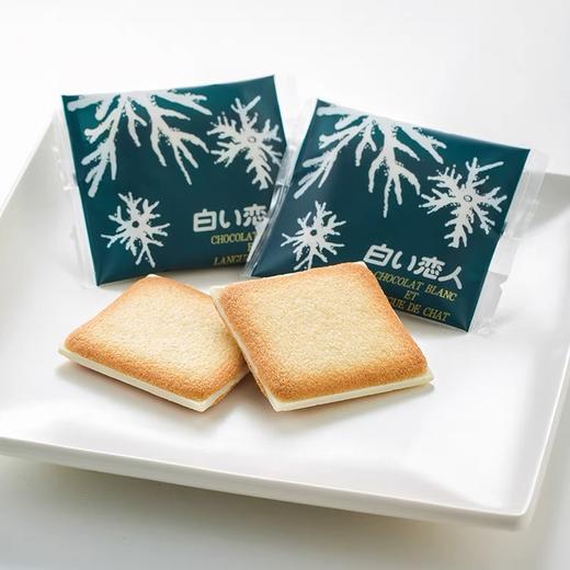北海道白色恋人巧克力夹心饼干  |  北海道畅销了40年的经典名物，拜北海道盛产牛奶所赐，其制作的点心就是 比其它产地多了一份难以言喻的美味，吃上一口，回味无穷！ 商品图3