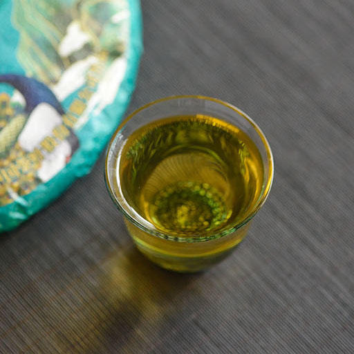 中粮-中茶2022年"一带一路"年度汉字(通)茶香丝路布朗山孔雀青饼生普357g /云南干仓直发 商品图3