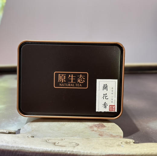 中秋新品｜【凤凰单丛·兰花香】（特级）干茶茶条俊秀，色泽黑褐润亮，香气高锐馥郁，汤色橙黄明亮，滋味醇香甘爽……净含量：250g、规格：1罐*250g，秋饮乌龙正当时，秋意浓浓，一起追一杯茶香。 商品图1