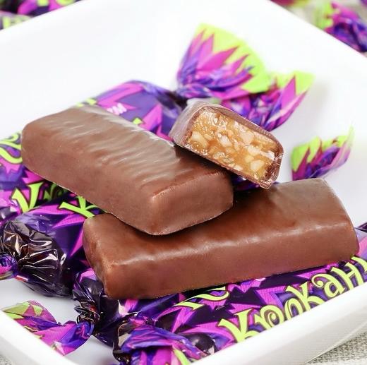 （买一送一）俄罗斯KDV牌花生扁桃仁巧克力味/椰蓉味/香橙味夹心糖-500g(紫皮糖） 商品图1