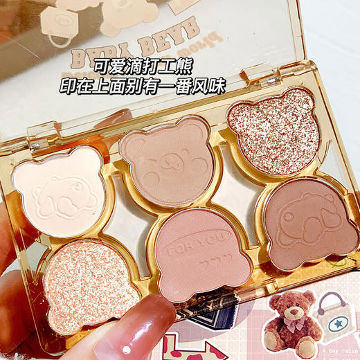 彩妆xixi打工熊六色眼影，清冷碎钻粉，紫蓝撞色，y2k仿妆，烟熏截断眼妆。自由奔放的色彩，演绎个性与时尚的完美结合。售罄速度惊人，艳丽魅惑的色彩让你瞬间成为焦点。 商品图0