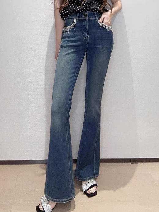 双纽扣腰头线条分割蓝喇叭裤 商品图1