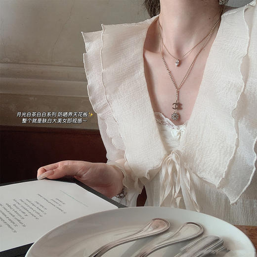 金蘑菇菇 doucuer月光白茶 / 温柔荷叶领喇叭袖仙气上衣防晒小衫 商品图3