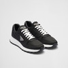 【三】PRADA 普拉达 男士珐琅金属三角徽标Re-Nylon休闲运动鞋 黑色 2EE369 3LFV F0632 商品缩略图0