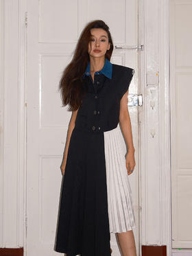 百褶中⻓拼接⽑边半身裙