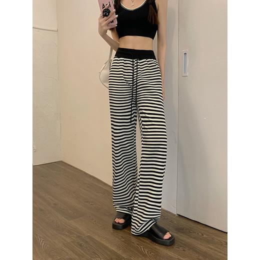 【个性十足！百搭显身材】新款韩版黑白条纹裤，夏季必备。长款高腰设计，修饰身材；九分阔腿裤型，舒适透气。简约百搭，自带时尚感。气质穿搭，彰显自信魅力！ 商品图2