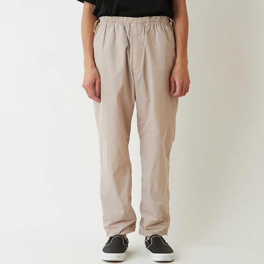 White Mountaineering 白山 TAPERED EASY 机能性面料锥形长裤 商品图0