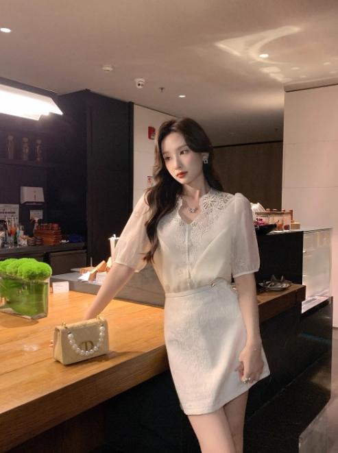 张心子【白玉雕琢】提花半身裙女短裙夏新款设计感小众高腰A字裙 U2404064 商品图8