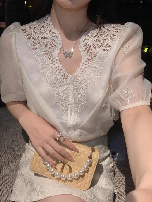 张心子【白玉雕琢】提花半身裙女短裙夏新款设计感小众高腰A字裙 U2404064 商品图0