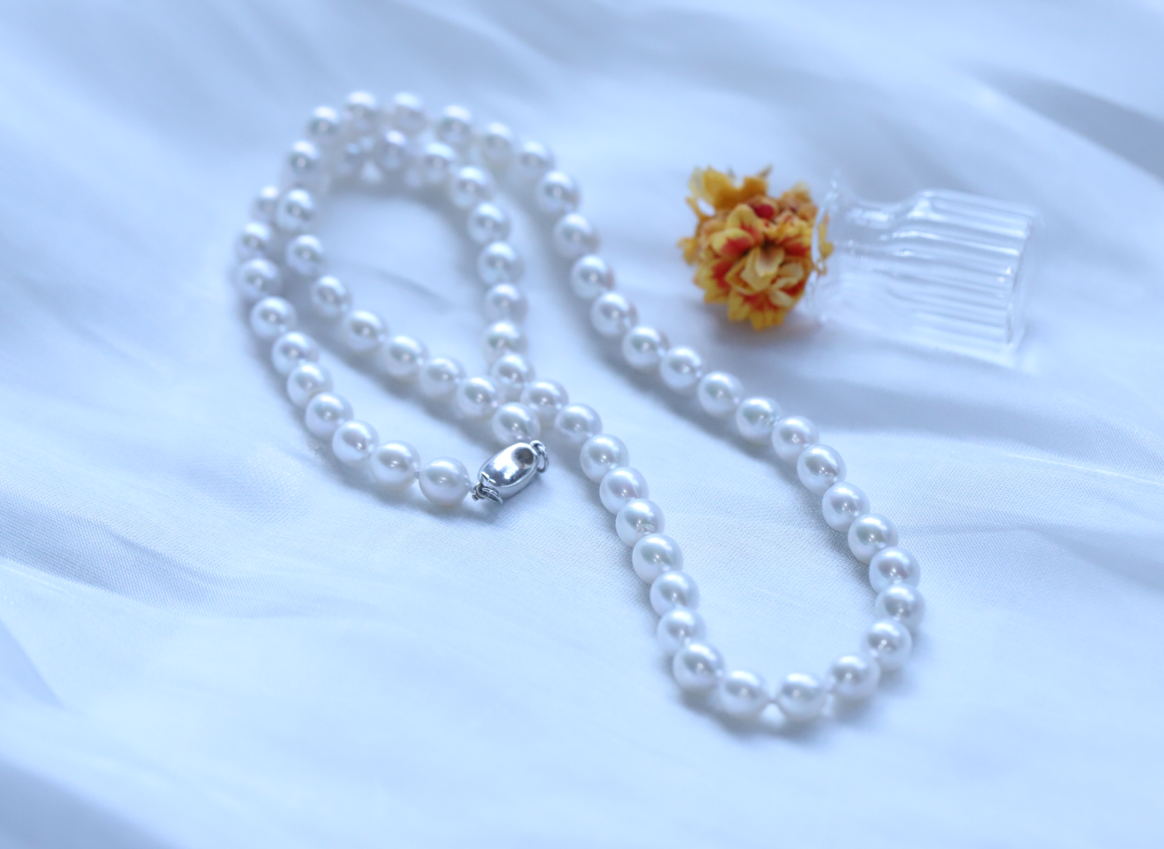 米马生活  天然淡水极光蛋形6-6.5珍珠项链  每一颗珍珠之间都有珍珠结~