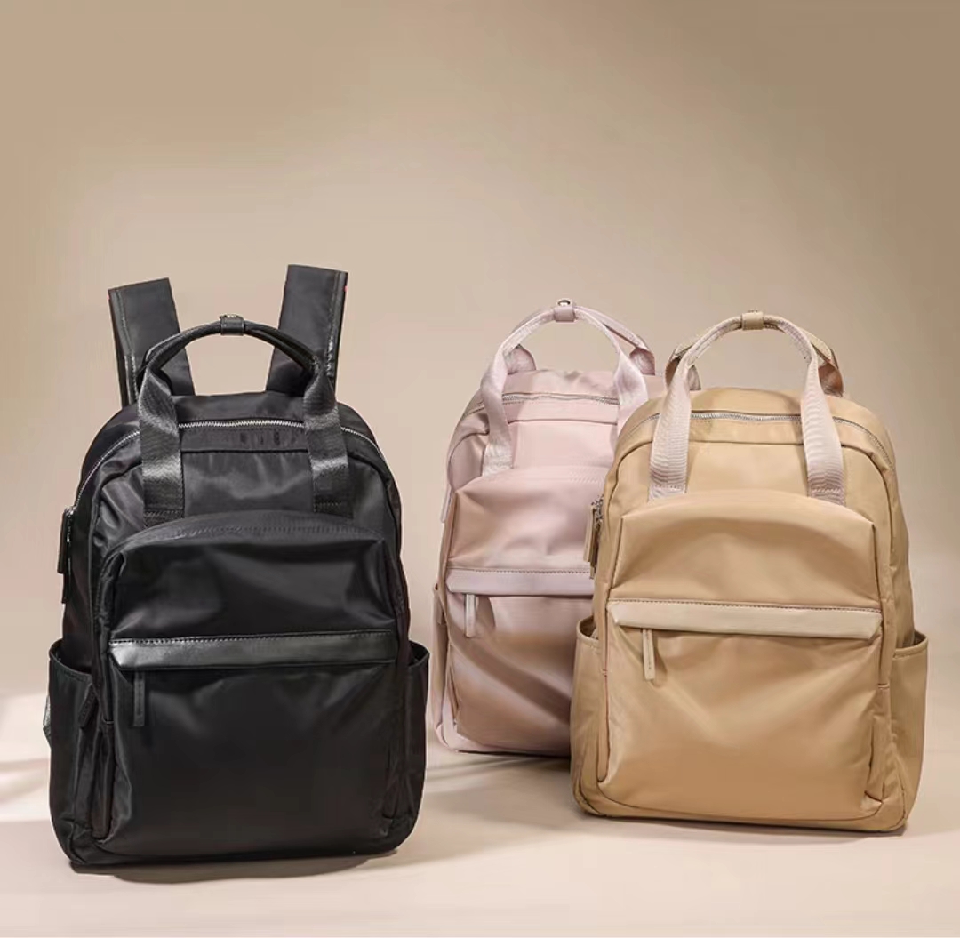 都宝路新款时尚潮流简约学院风通勤出游百搭休闲双肩包