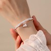 卡蒂罗/KADER 祥云莲手镯 999足银新中式古风花开并蒂莲花路路通可推拉花丝银镯 优雅美好福气绵延配饰 礼盒款女友 商品缩略图3