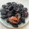 新疆西梅干~自然风干，不含甜蜜素、添加剂，纯净的西梅干。味道酸甜很自然，孕妇老人孩子都可以吃。 商品缩略图2