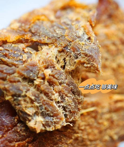 百吃不厌的正宗手撕牛肉干，比市面风干工艺更鲜香有嚼劲，入口牛肉味浓厚紧实！ 高蛋白低脂肪健康小零食，好吃不长肉！最新生产日期，保质期365天！ 商品图2