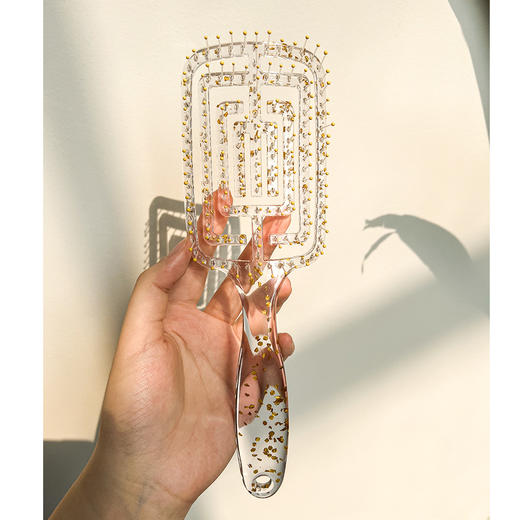 【居家造型好帮手排骨梳子】排骨梳子透明闪粉塑料镂空梳家用，抚顺炸毛 拯救毛躁发丝，女士长发卷发梳头部按摩梳子 商品图0