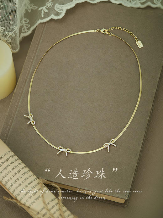 Oflye潮流饰品   高级感气质法式优雅小众设计风格小蝴蝶结珍珠项链 商品图1