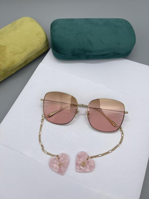 G家 眼镜框 新款齐色[玫瑰] 倪妮项偞婧广告款 潮流太阳镜大框搭配吊坠一对非常漂亮的女神范 个性十足的一款时尚太阳眼镜墨镜 型号 GG1030SK 商品图5