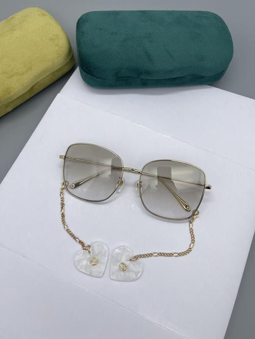 G家 眼镜框 新款齐色[玫瑰] 倪妮项偞婧广告款 潮流太阳镜大框搭配吊坠一对非常漂亮的女神范 个性十足的一款时尚太阳眼镜墨镜 型号 GG1030SK 商品图2