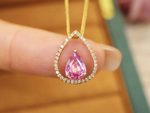 D523160 无烧帕帕拉恰蓝宝石吊坠 石重：0.86ct，总重：0.98g，钻石：0.111ct/37颗，吊坠：不含链子 18K黄金，真金真钻石 特价：2700 商品图0