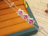 523159 无烧帕帕拉恰蓝宝石手链 石重：1.63ct，总重：7.02g，钻石：0.312ct/90颗 18K白金，真金真钻石 超值价：7480 商品缩略图1
