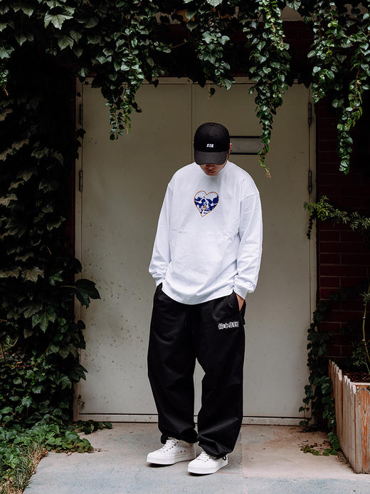 STA2024秋季偷心集团经典基础黑色休闲长裤 商品图6