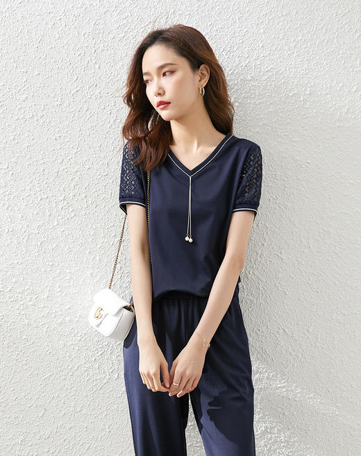 【五折购】熙世界夏款气质蕾丝衫裤子休闲套装女舒适运动套装女 商品图0