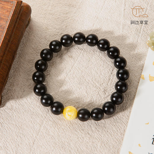 蜜蜡顶珠角乌家具老料制手串直径1.1cm 商品图0