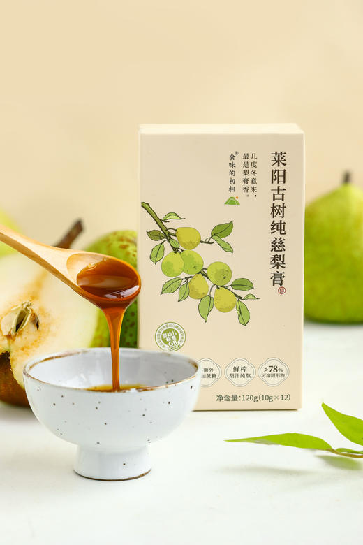 【冲调饮品|百年梨树莱阳慈梨膏  每盒10g*12条】仅古树梨榨汁低温纯熬，不加一滴水，经人工挑选，保障梨的新鲜度和品质，经过古法熬制，梨膏香气天然馥郁，食用方法多样，做抹酱、冲饮、馅料、调味辅食皆可 商品图0