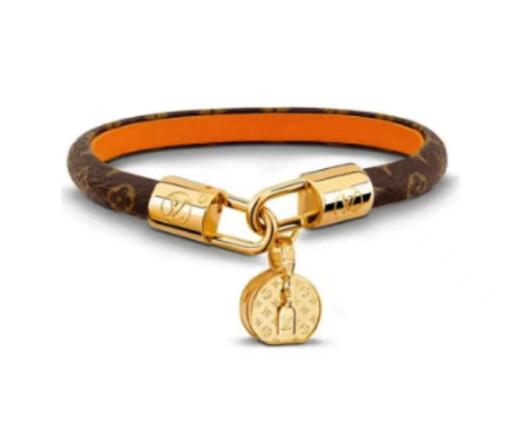 LOUIS VUITTON Tribute Monogram 帆布小生皮内衬 金色金属帽盒坠饰 老花手镯  女款 棕色 商品图0