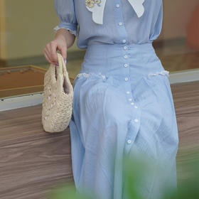 冰蓝夏花II2024夏季新款森系风纽扣装饰a字高腰半身