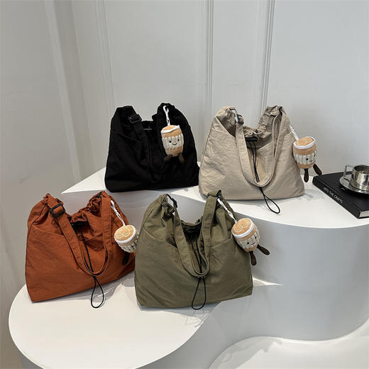 「29.9到手！拼团同款」韩版休闲文艺帆布水桶包 时尚抽绳单肩女包网红褶皱尼龙水洗斜挎包箱包 商品图1