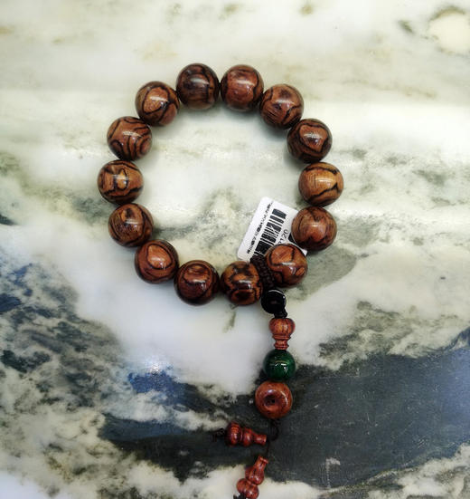 1.6平安扣°海黄鬼脸手串 14颗 商品图0