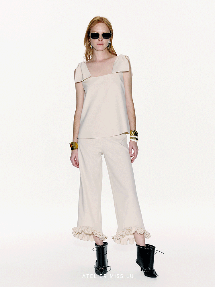 【萌耳闪闪】造型蝴蝶结设计A字上衣